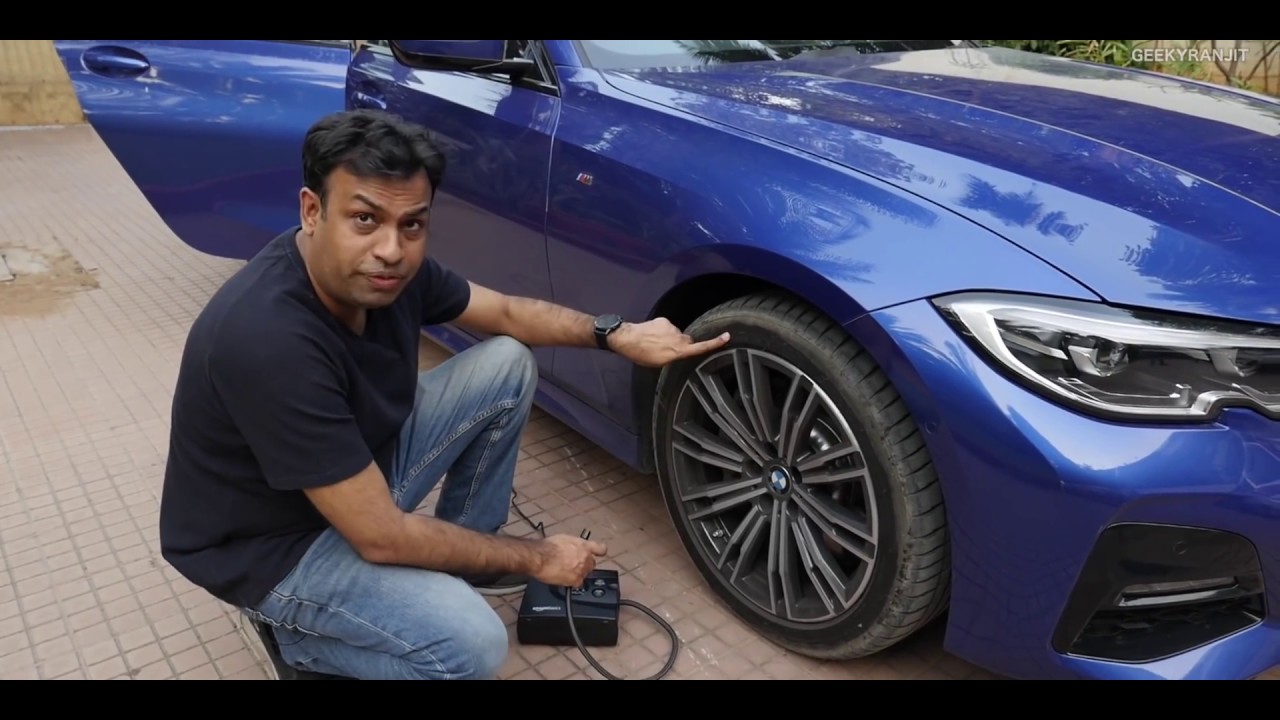 An application scenario or product detail of air pump on a car - Image 18