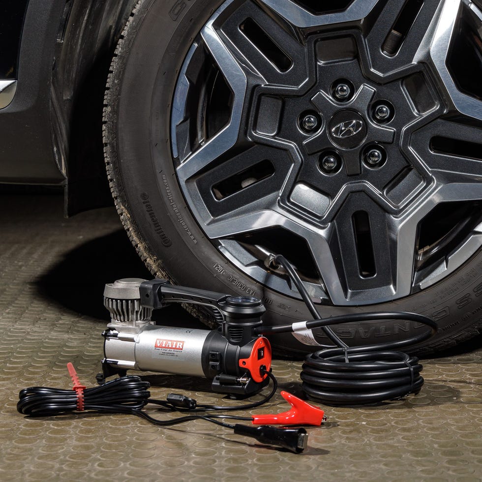 An application scenario or product detail of car air pump nearby - Image 11