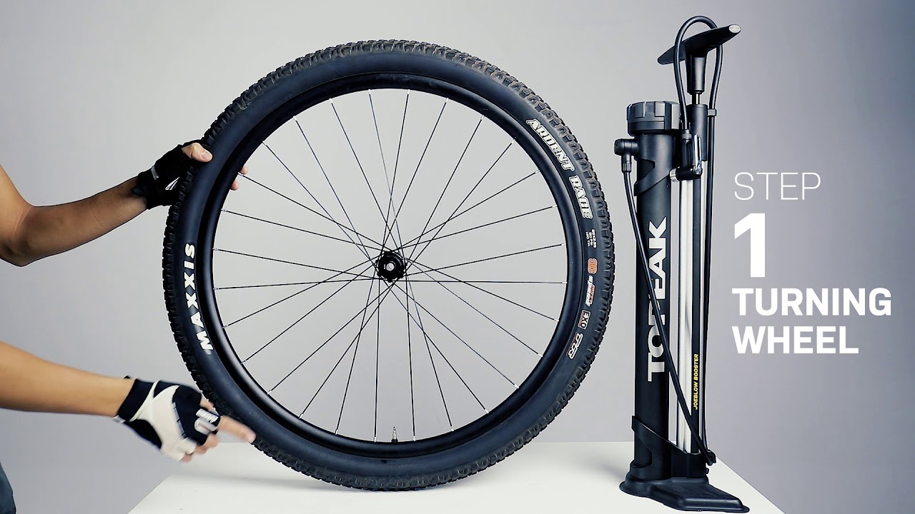 An application scenario or product detail of how to inflate a tubeless bicycle tire - Image 6