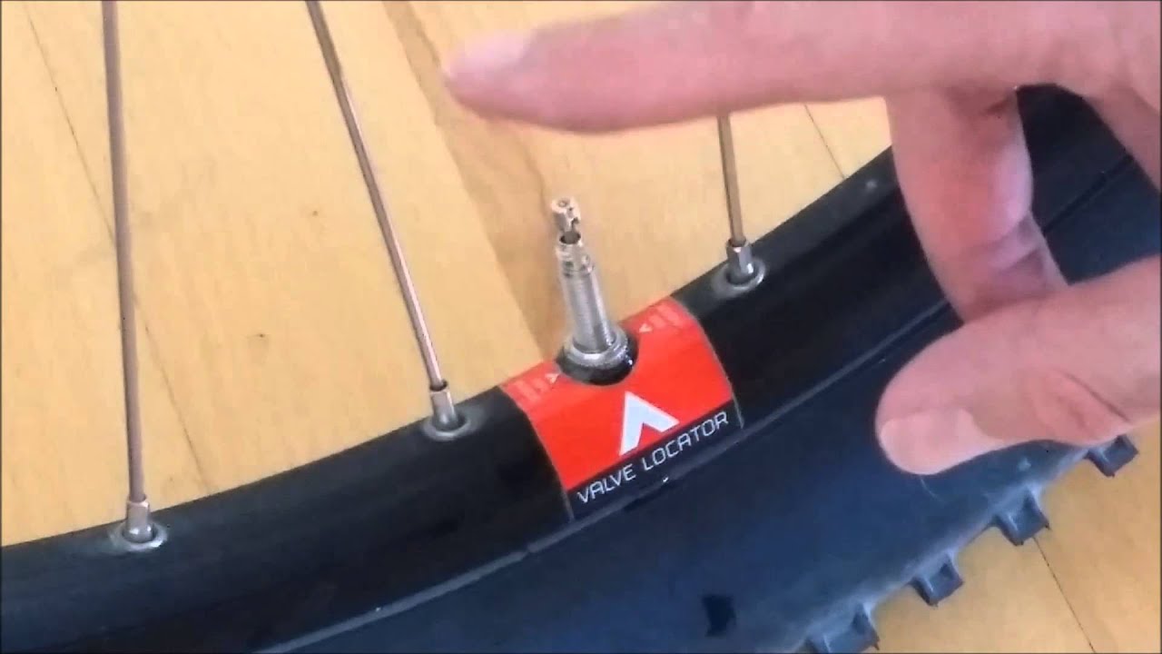 An application scenario or product detail of how to inflate a tubeless bike tire - Image 13