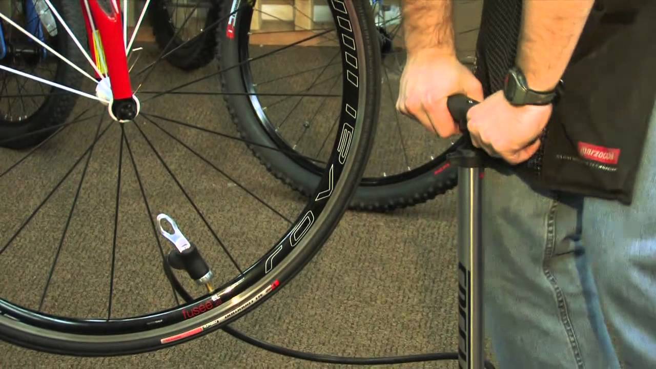 An application scenario or product detail of how to inflate road bike tires - Image 1