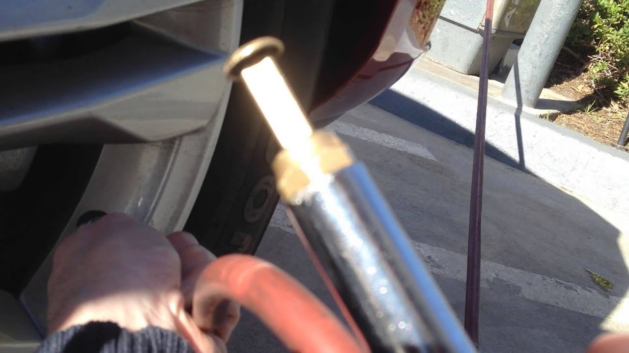 An application scenario or product detail of how to inflate tires at gas station - Image 5