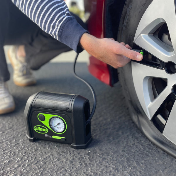 An application scenario or product detail of how to use a slime tire inflator - Image 3